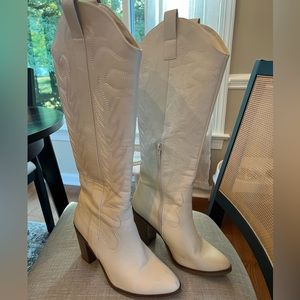 White knee high boots